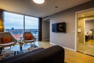 sitting area in master suite at scandic aarhus city