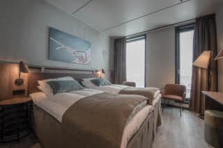 bed in standard room at scandic sortland