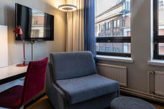 armchair in superior room at scandic kaisaniemi in helsinki