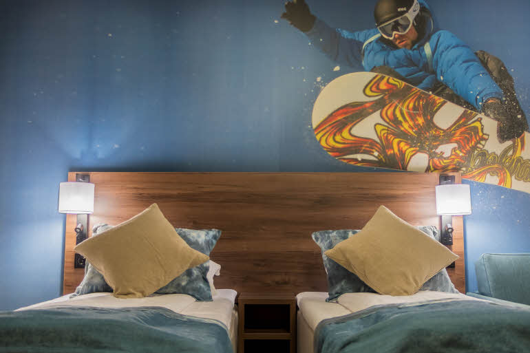 Twin bed in room