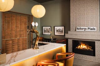 Fireplace and old safety deposit boxes, Scandic Holberg