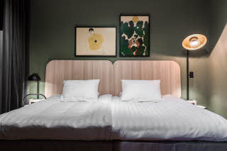bed in junior suite at scandic rukahovi in ruka