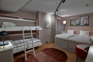 beds in room standard family at scandic klara in stockholm