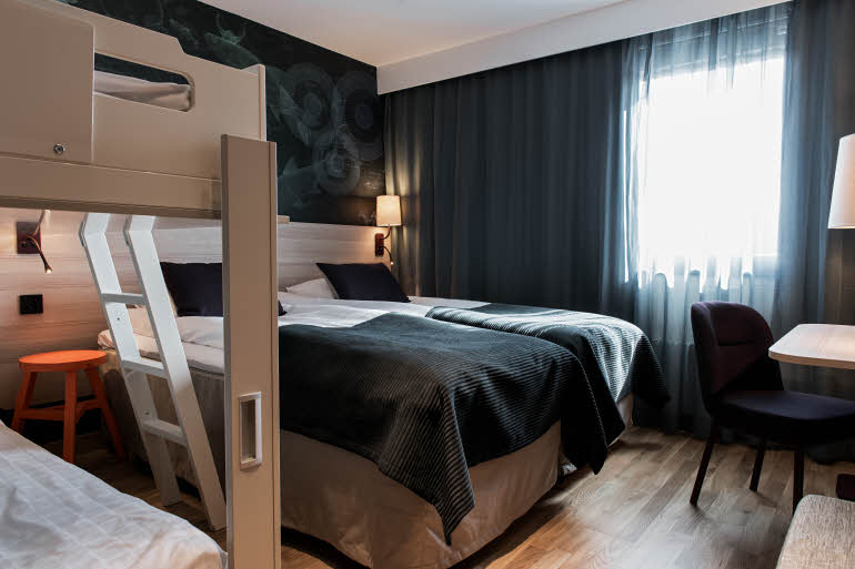 Bunk bed and bed in Standard Family room at Scandic Täby