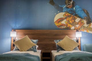 Twin bed in room