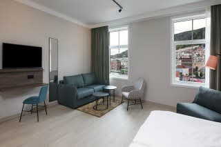 Junior Suite living area sofa Scandic Torget Bergen