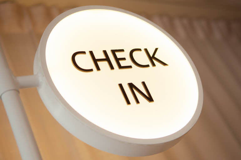 Check-in sign