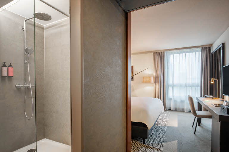 Bathroom in Standard with courtyard view