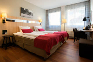 Beds and desk in Standard Twin room at Scandic Sundsvall City
