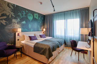 Bed in Superior room at Scandic Luleå