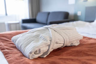 bathrobe in room superior at scandic rosendahl in tampere finland