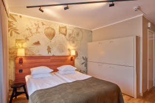 Bed in Standard family room at Scandic Luleå