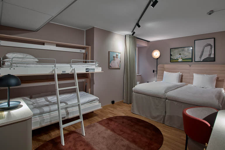 beds in room standard family at scandic klara in stockholm
