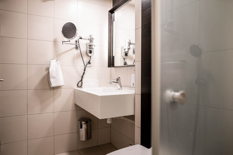 Bathroom in Standard room at Scandic Anglais in Stockholm
