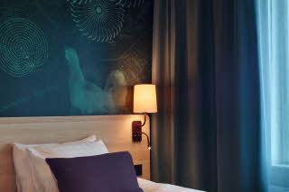 Säng in Superior room at Scandic Luleå
