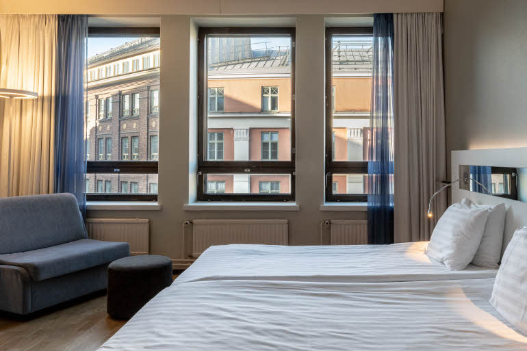 bed in superior room at scandic kaisaniemi in helsinki